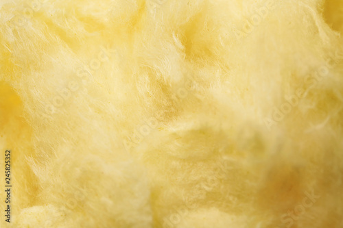 Fluffy yummy cotton candy as background, closeup