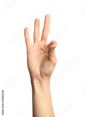 Woman showing number nine on white background, closeup. Sign language