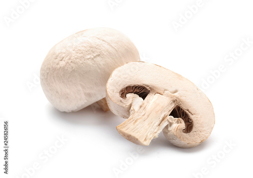 Fresh champignon mushrooms on white background, closeup