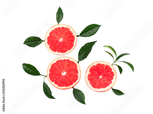 Citrus fruits isolated on white background. Pieces of pink grapefruit isolated on white background  with clipping path. Top view.