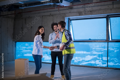 business people in group, architect and engineer on construction site