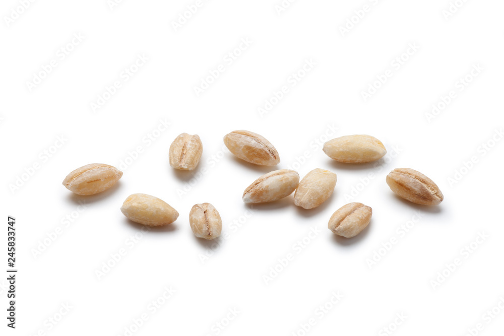 Close-up of peeled barley on white background. Close-up of peeled barley on white background.