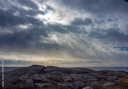 sunset over the sea, rocks, Peggy's Cove, Nova Scotia