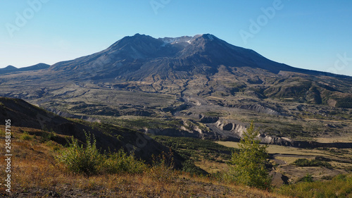 Mount Saint Helens in Washington State as seen from the Johnstin Ridge Observatory Boundary Trail on a clear, cloudless autumn morning.