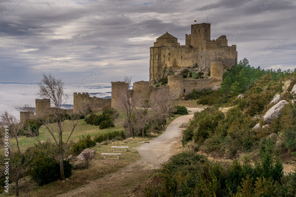 Winter view of medieval partially restored Romanesque Loarre castle near Huesca in Aragon region Spain with round towers, donjon, on top of a high rock