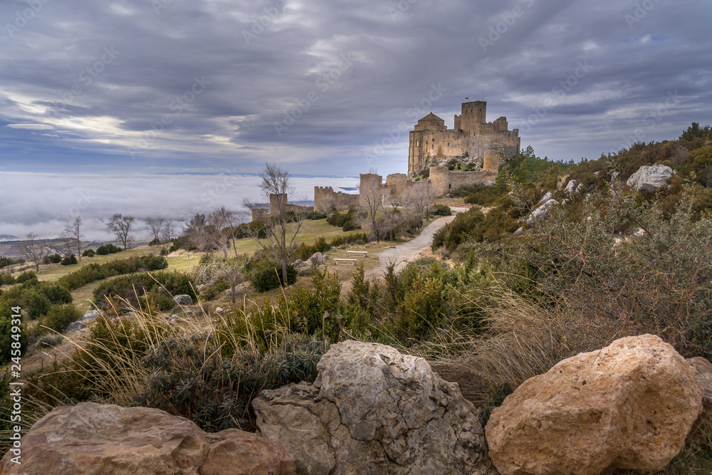 Winter view of medieval partially restored Romanesque Loarre castle near Huesca in Aragon region Spain with round towers, donjon, on top of a high rock