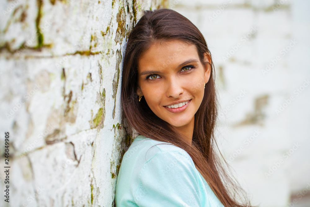 Closeup portrait of a happy young woman smiling Closeup portrait of a happy young woman smiling