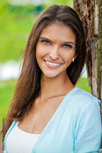 Portrait of beautiful young happy woman