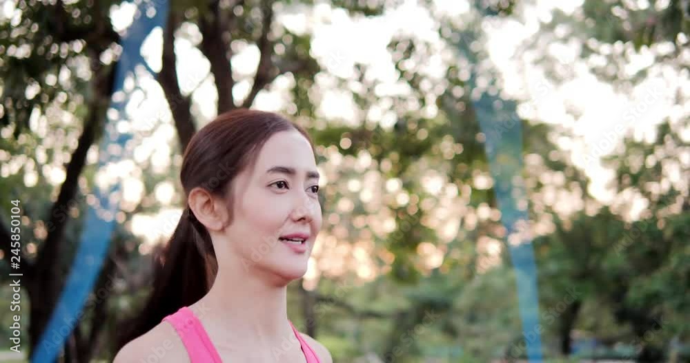 Asian beautiful woman training at the park working out is healthy fitness body. Healthcare and sport concept. Asian beautiful woman training at the park working out is healthy fitness body. Healthcare and sport concept.