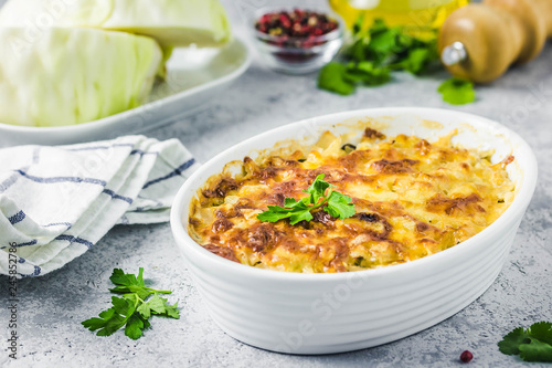 Cheesy suffed cabbage and mushroom casserole. Selective focus, space for text.