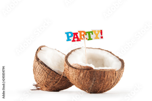 Coconut isolated on white background. Fragmented coconut close up. Topper inscription party