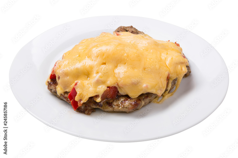 baked pig meat with vegetables and cheese, on a plate, on a white background