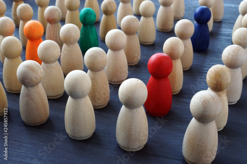 Crowd of colored figures. Recruitment and talent search. Uniqueness and individuality.