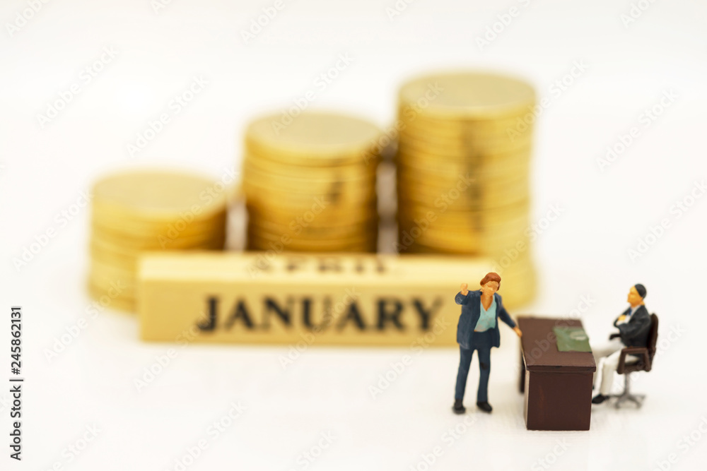 Miniature people: Businessmen standing with coins stack, Finance, investment and growth in business concept. Miniature people: Businessmen standing with coins stack, Finance, investment and growth in business concept.