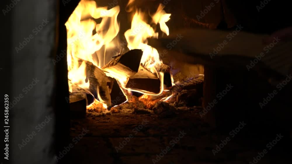 Someone puts birch wood in the oven Someone puts birch wood in the oven