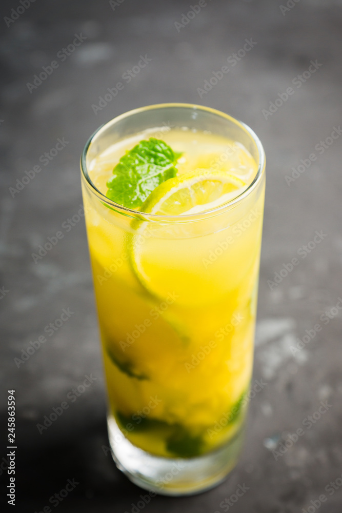 Fresh pineapple mojito on rustic background. Selective focus. Shallow depth of field. Fresh pineapple mojito on rustic background. Selective focus. Shallow depth of field.