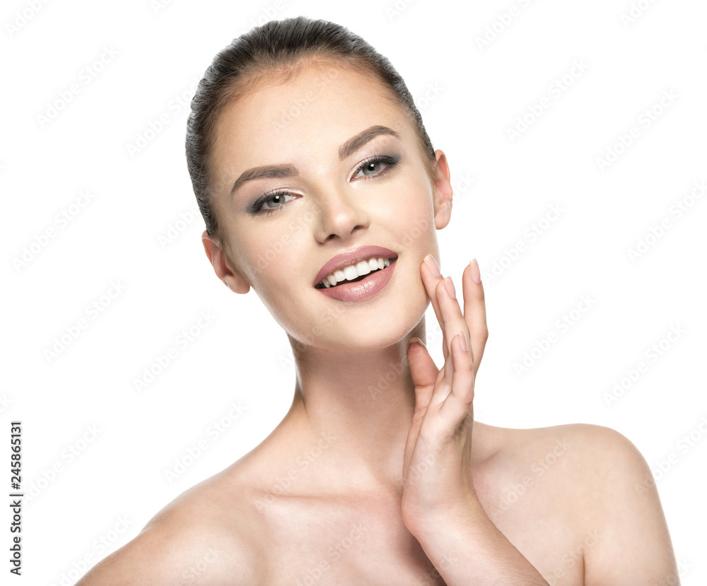 Beautiful woman cares for the skin face - isolated on white Beautiful woman cares for the skin face - isolated on white