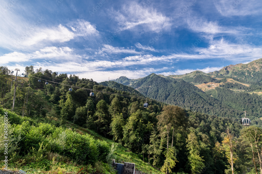 Mountain cableway. Sunny summer day.