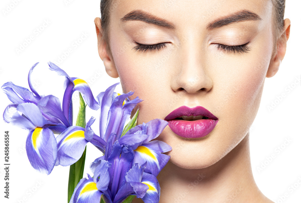 Portrait of young beautiful woman with a healthy clean skin of the face Portrait of young beautiful woman with a healthy clean skin of the face