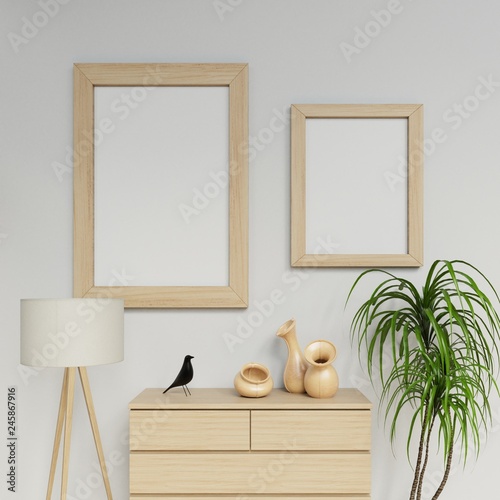 clean interior space 3d rendering of two a1 and a2 poster mockup design with vertical wooden frame hanging on the clean white wall in family room in straight front camera view