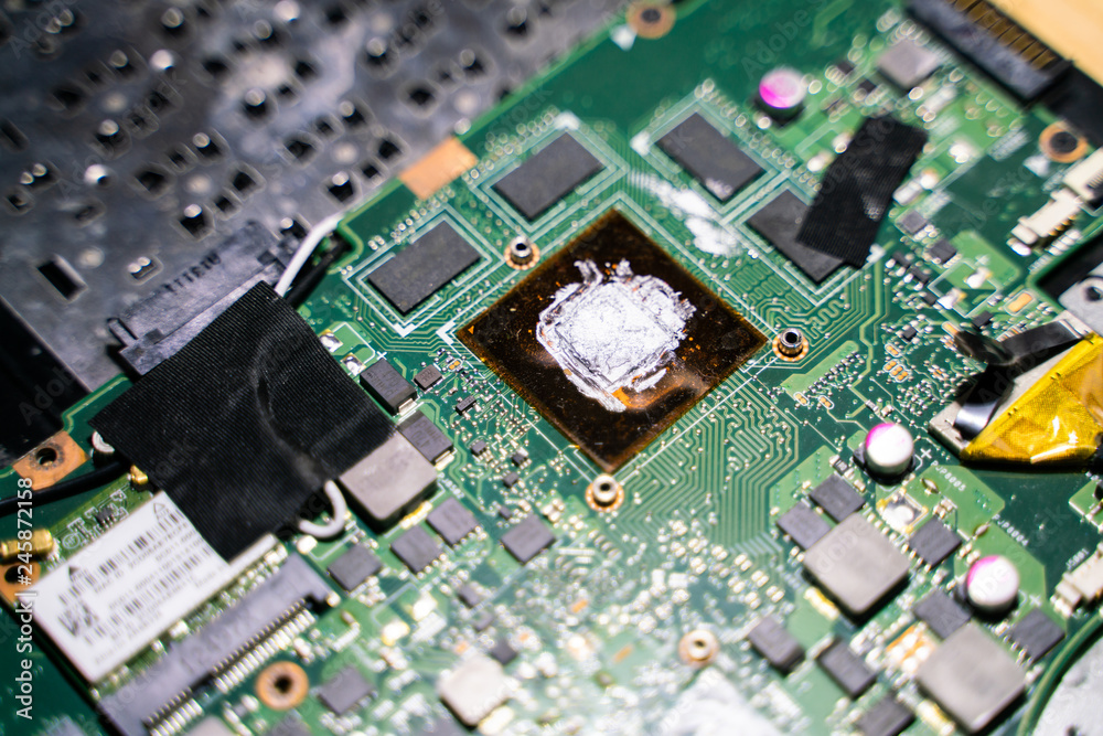 Abstract electronic circuit on computer mainboard close up