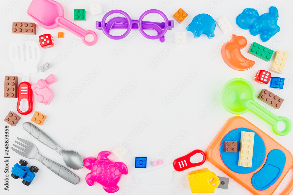 Kids toys background with colorful blocks, white background Kids toys background with colorful blocks, white background