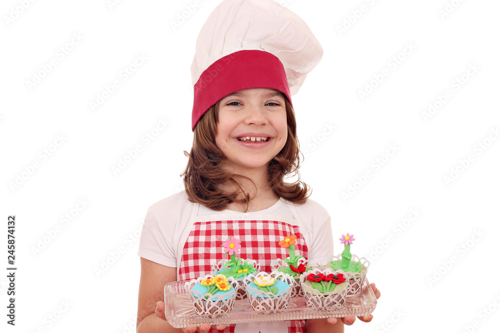 happy little girl cook with sweet muffins decorated as spring flowers happy little girl cook with sweet muffins decorated as spring flowers