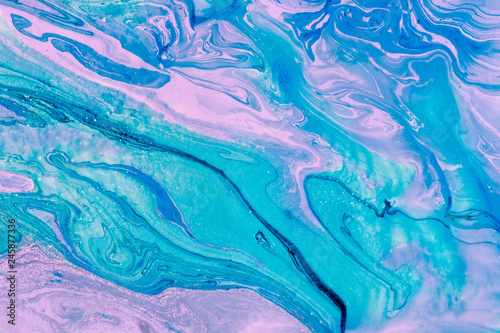 Blur marbling blue-violet texture as creative background. Abstract oil painted waves. Handmade art. Liquid paint.