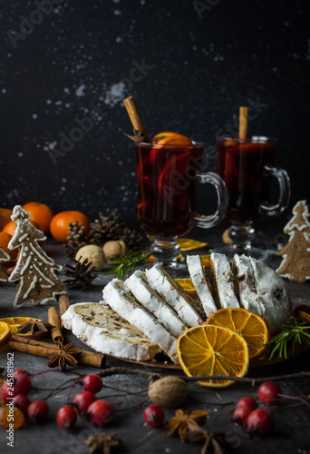 Traditional stollen and milled Hot wine cake and Christmas decorations