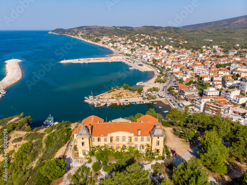 Postcard from Thassos. Aerial view of Limenaria Castle, now abandoned and Limenaria town and port photo