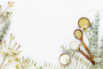 Bio herbal green eucalyptus branches cosmetic arrangement, sea salt and handmade cosmetic.