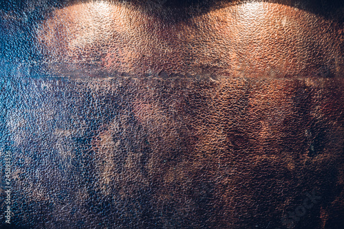 Billede på lærred Chasing copper clad kitchen wall work surface with lighting from above