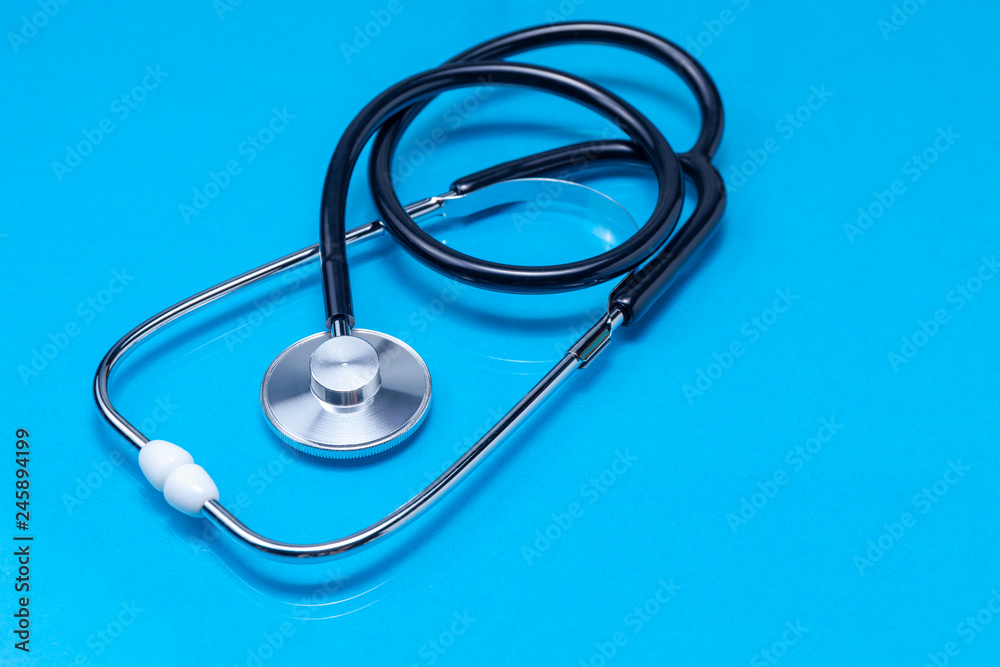 Stethoscope isolated on blue background,Medical background concept Stethoscope isolated on blue background,Medical background concept