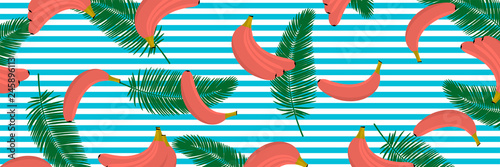 Banana in coral color with tropical liaves background. Seamless pattern with tropical palm leaves and bananas photo