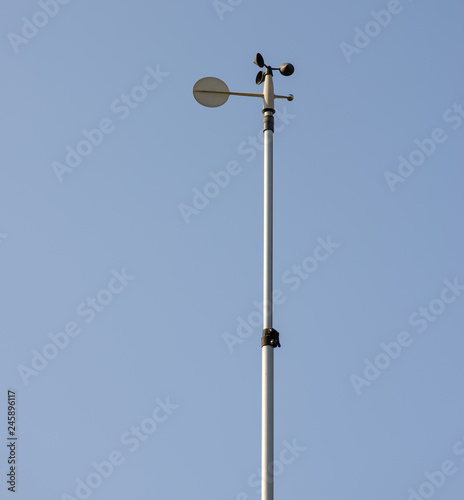 Meteorological station with anemometer and wind vane.