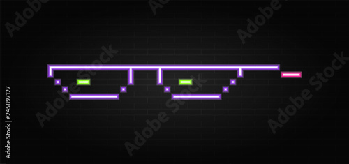 Neon glasses pixel on building wall background. Glasses pixel neon.