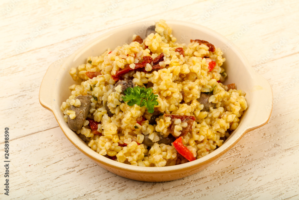 Bulgur with chicken hearts
