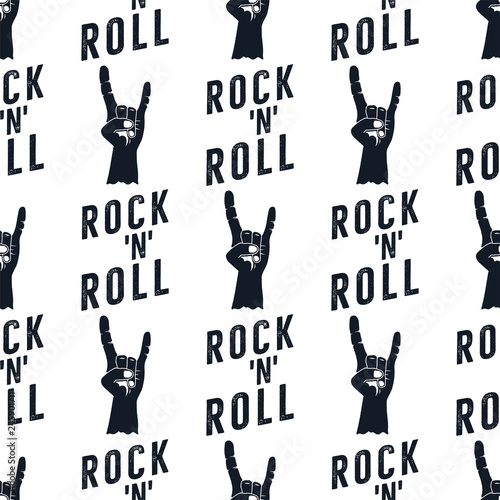 Rock n Roll pattern with hand sign icon and typography elements. Silhouette retro style seamless hard music background. Stock vector monochrome heavy musical wallpaper
