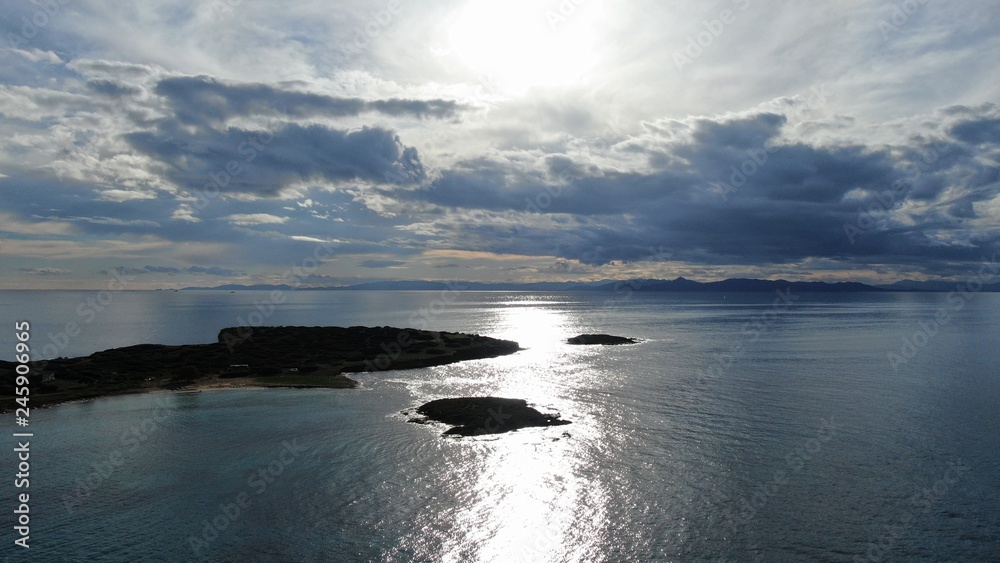 Aerial drone photo of beautiful sunset with nice clouds and golden colours over the Ionian sea Aerial drone photo of beautiful sunset with nice clouds and golden colours over the Ionian sea