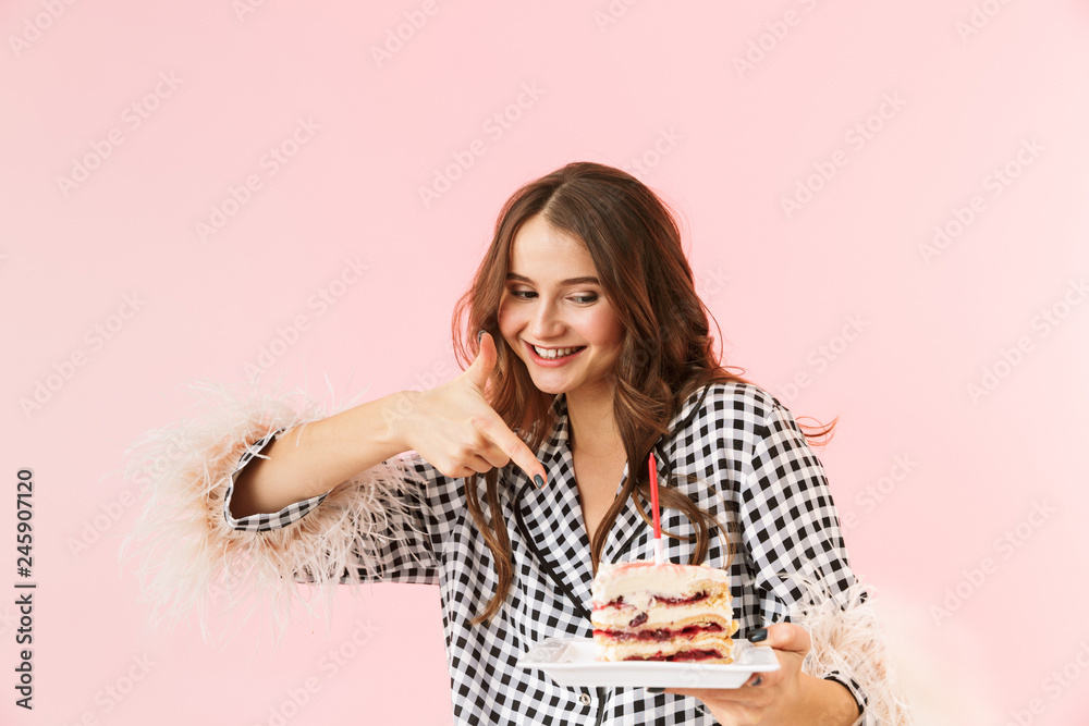 Beautiful young woman standing isolated over pink Beautiful young woman standing isolated over pink