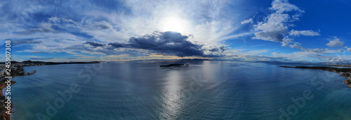 Aerial drone photo of beautiful sunset with nice clouds and golden colours over the Ionian sea