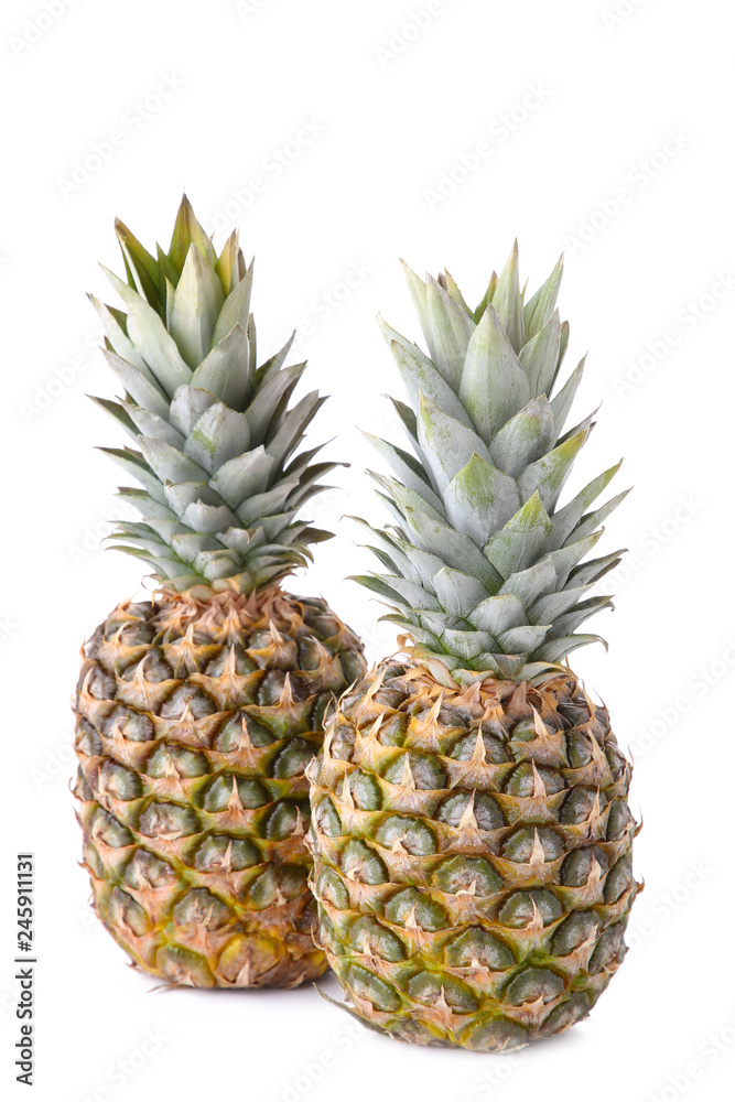 Two pineapples isolated on white background