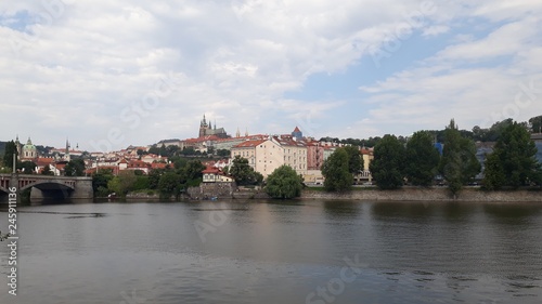 view of castle and charles bridge in prague