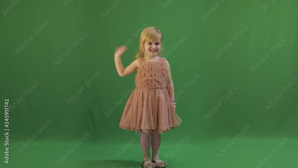 Happy three years old girl. Cute blonde child. Brown eyes. Green screen video Happy three years old girl. Cute blonde child. Brown eyes. Green screen video