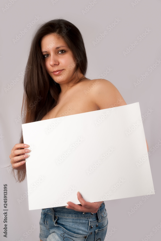 Attractive sexy topless woman holding blank banner Attractive sexy topless woman holding blank banner