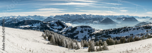 Panoramic view on snowy Swiss Alps as seen from the Queen of the Mountains - Mount Rigi