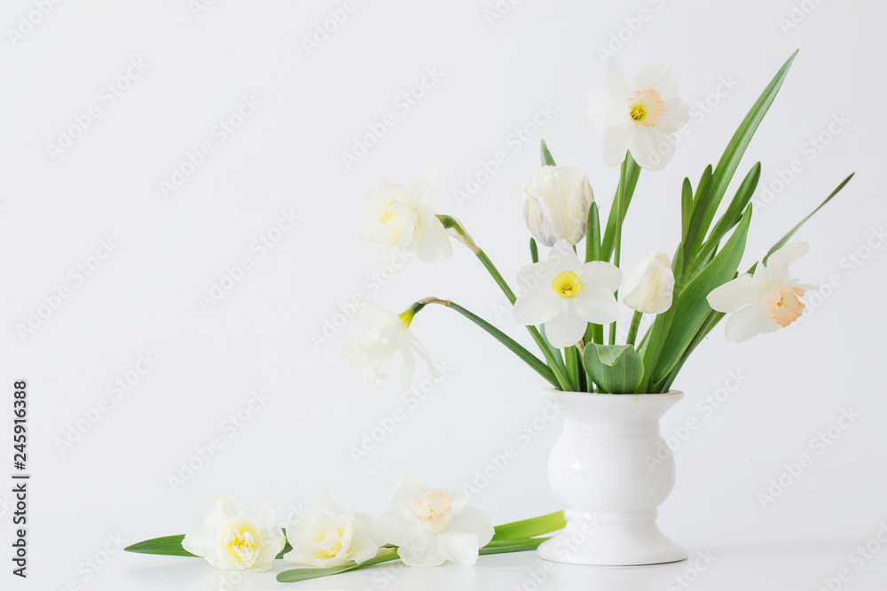 spring flowers in white vase