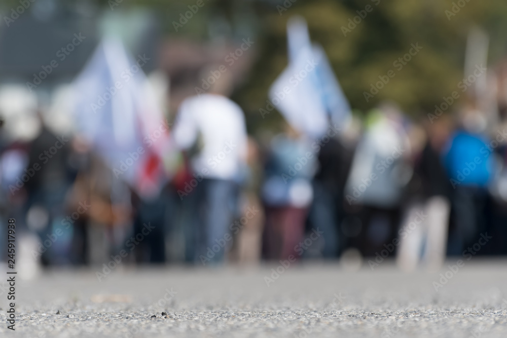 Blurred image of a crowd on the street