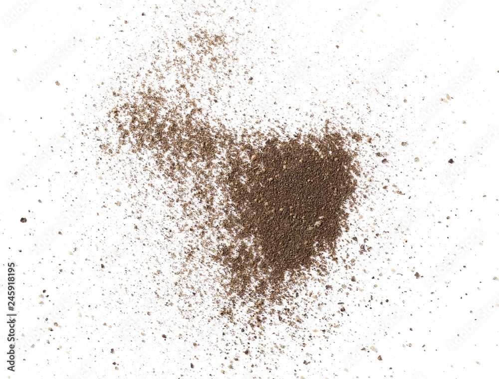 Ground black pepper powder isolated on white background, top view