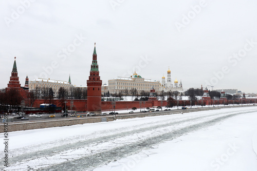 View of the frozen Moscow river and Kremlin in winter. Scenic Moscow after snowfall, cloudy cold weather, russian tourist landmark